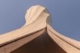 worm's eye view of twisted wood sculpture