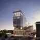 tall gray building at dusk