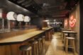 room with wood bars and stools