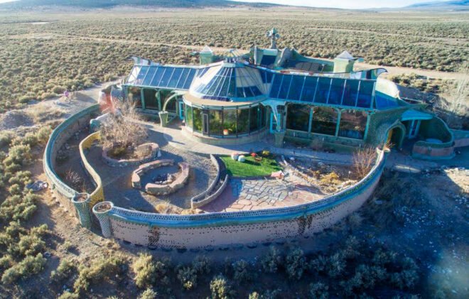 aerial view of earthship lodging made from recycled and natural materials