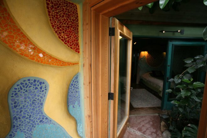 close-up of colorful wall made from natural materials like clay