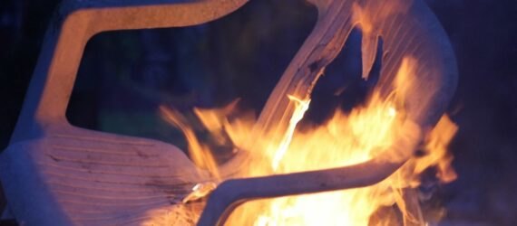 plastic lawn chair on fire