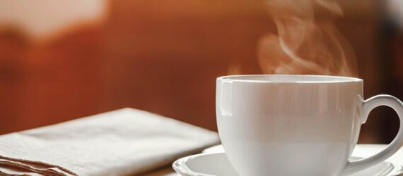 coffee cup with newspaper