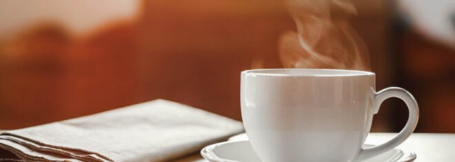 coffee cup with newspaper
