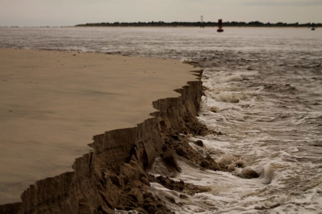 coastal erosion shows how large pieces of sand are disappearing