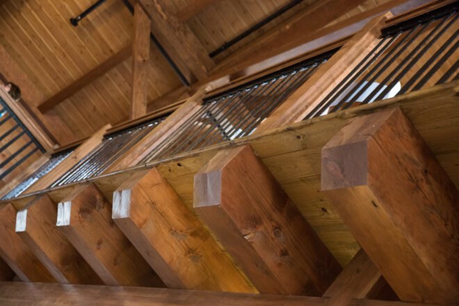 large timber wall with exposed beams