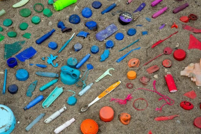 colorful pieces of plastic on a beach