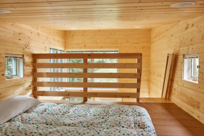 wooden loft with large bed