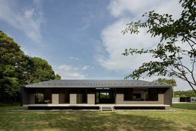 black timber home with mono-pitched roof