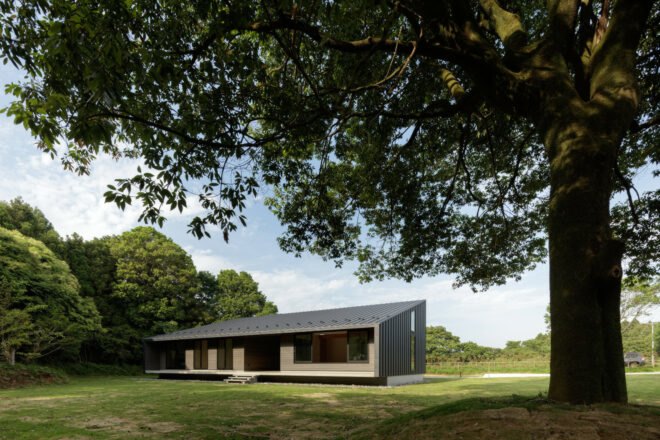 black timber home with mono-pitched roof