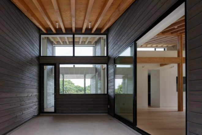 entrance way with glass and timber walls