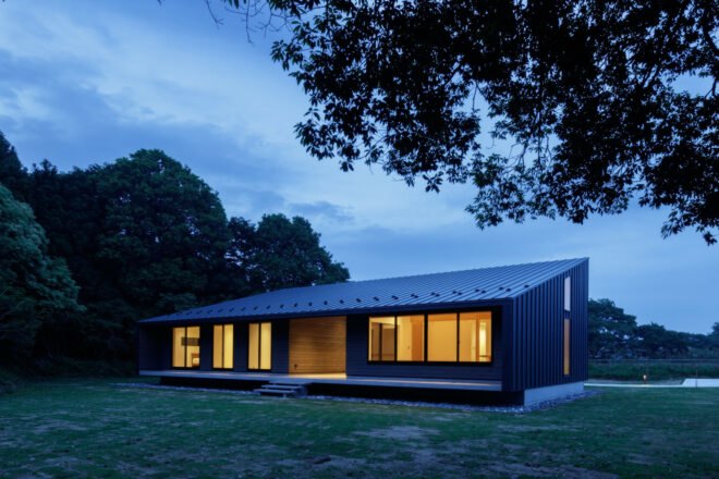 black timber home with mono-pitched roof