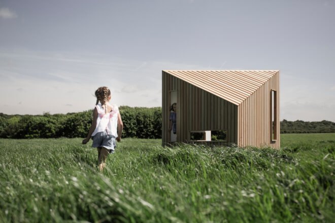 kids playing in an angular playhouse
