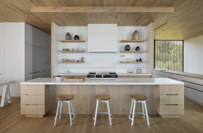 interior of home with wooden floors and walls with stools
