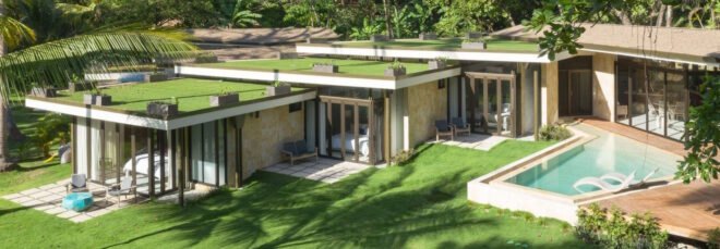 staggered home with green roofs