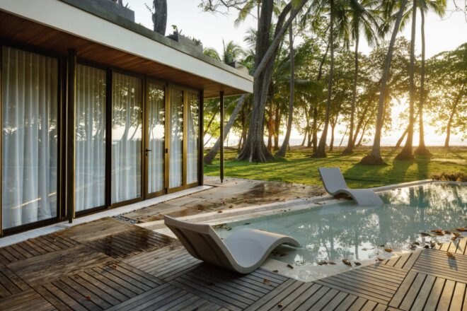 lounge chairs beside a pool