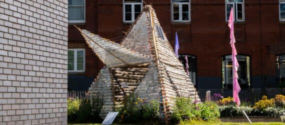 small shelter made out of recycled plastic bottles