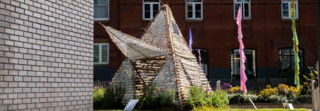 small shelter made out of recycled plastic bottles