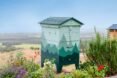 colorful bee hive made out of wood