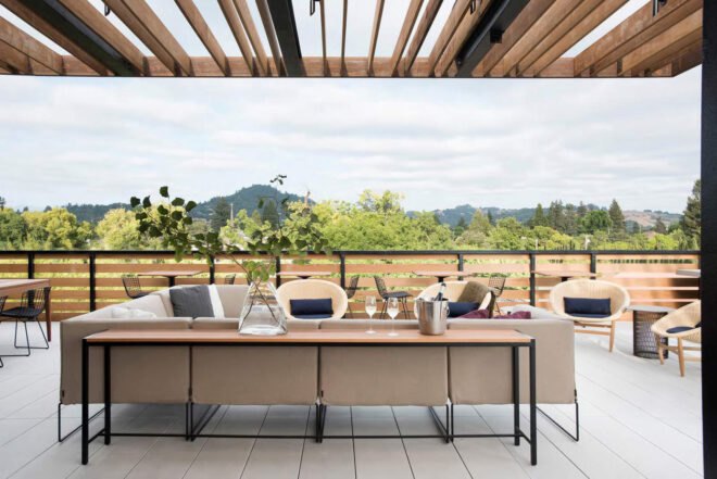 outdoor lounge with beige sectional sofa