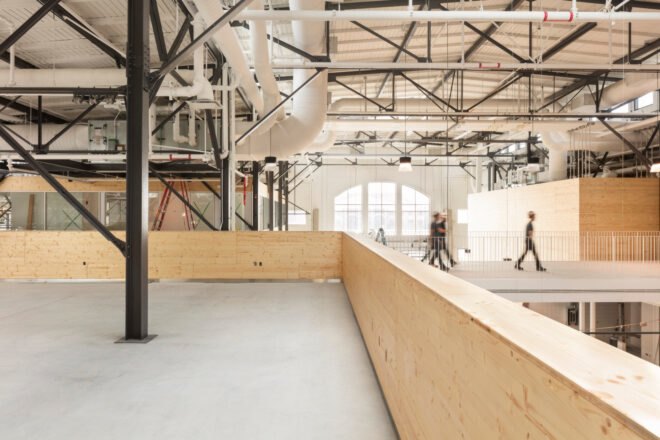 indoor market with concrete floors and wooden partition