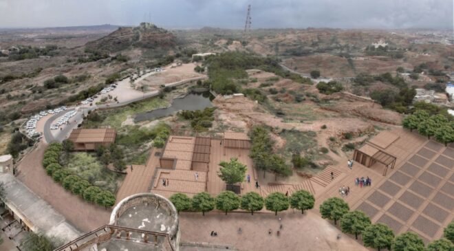 aerial rendering of new brown buildings near a fort