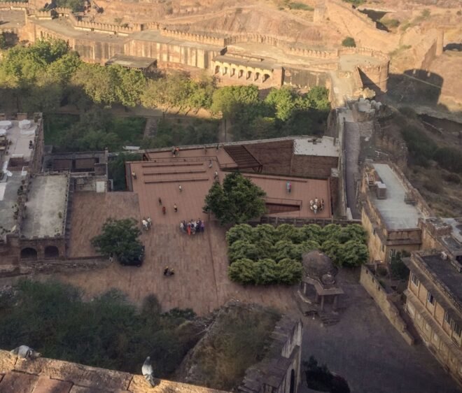 rendering of brown walkways near an old fort