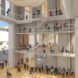 rendering of building interior with open staircases and multiple floors