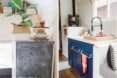a chalkboard and compact kitchen space
