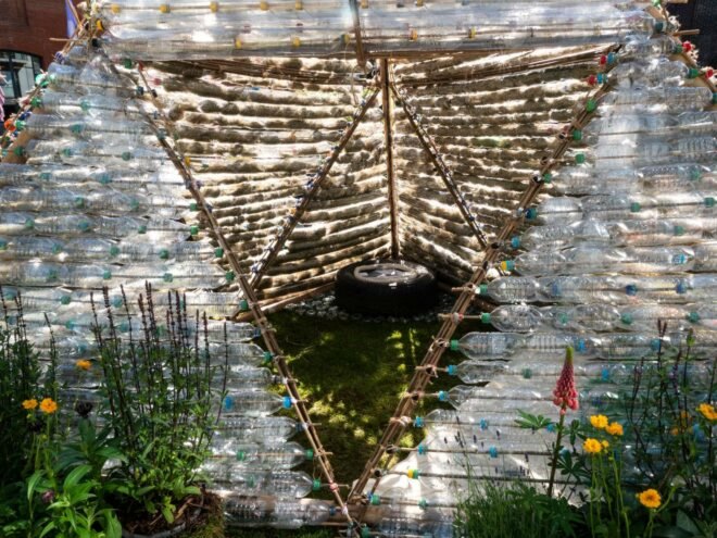 opening leading to shelter made of plastic bottles
