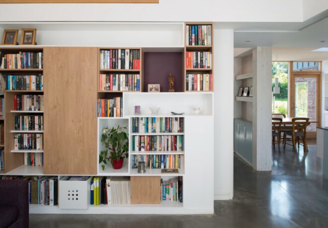 a wall lined with bookshelves