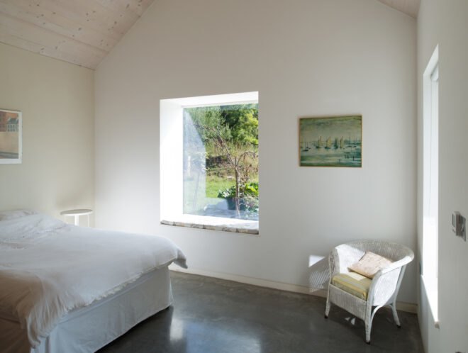 bedroom with large square window
