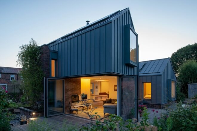 zinc and brick home with large square windows