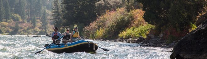 group of people rafting in river