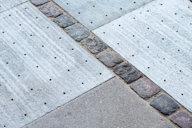 sidewalk tiles with tiny holes for absorbing water