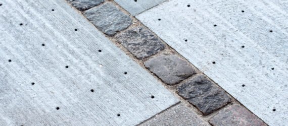 sidewalk tiles with tiny holes for absorbing water
