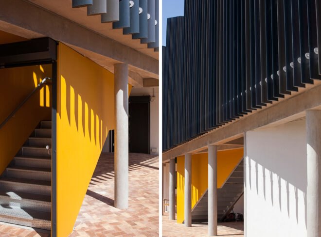 staircase leading to black and yellow building