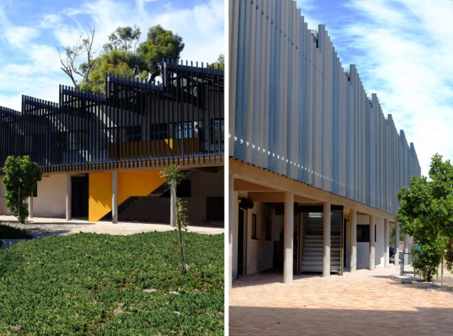 black and yellow building with dramatic sawtooth roof