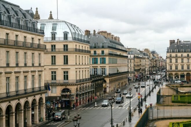 cars driving through streets of Paris