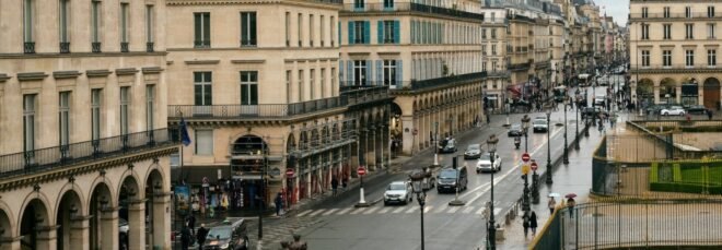 cars driving through streets of Paris