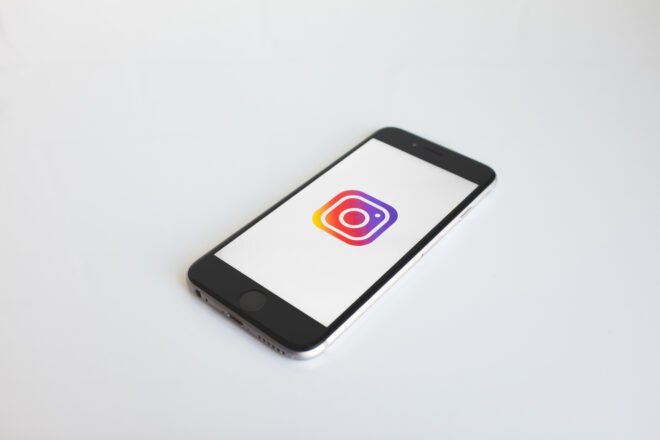 phone with colorful Instagram logo on the screen