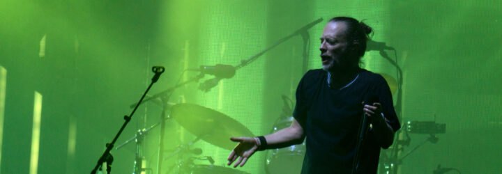 Thom Yorke of Radiohead singing on stage
