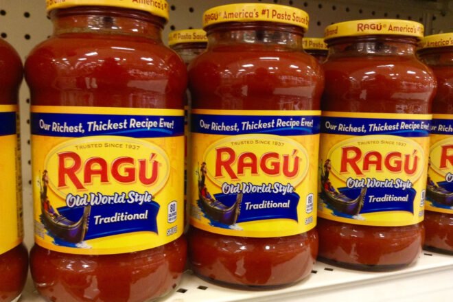jars of Ragú pasta sauce on grocery store shelf