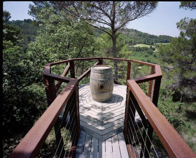 walkway leading out to wine barrel