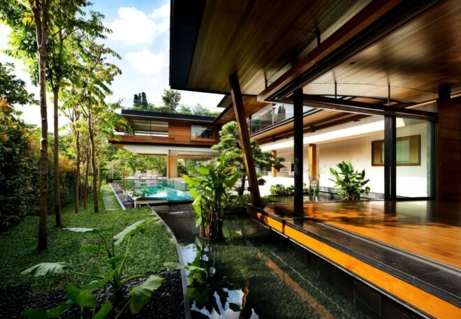 outside deck of home with a swimming pool