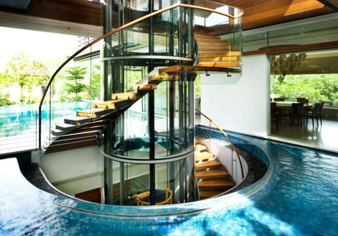 A rounded staircase surrounded by water