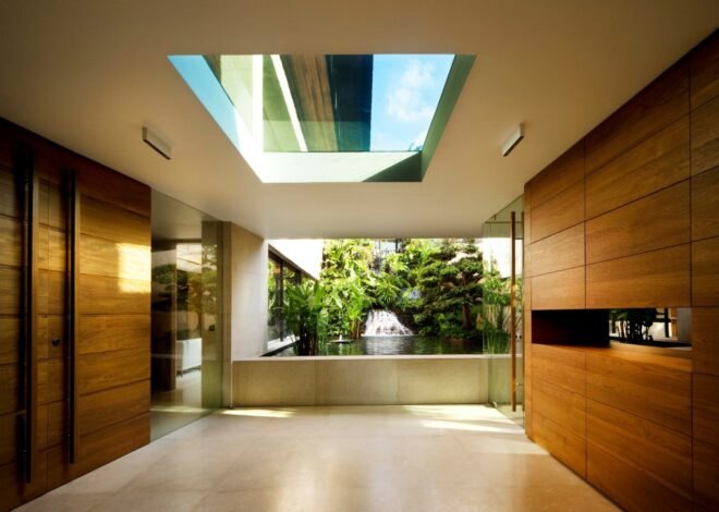 large, spacious room with skylight and large window