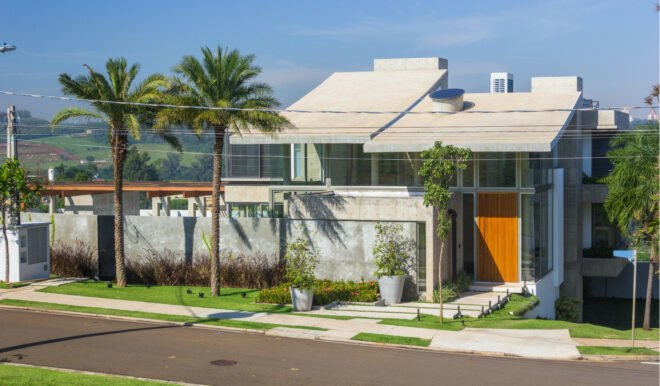 concrete home with large overhang
