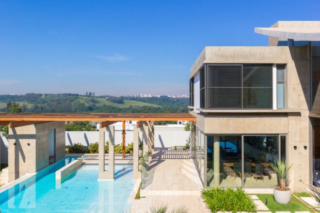 concrete home with swimming pool