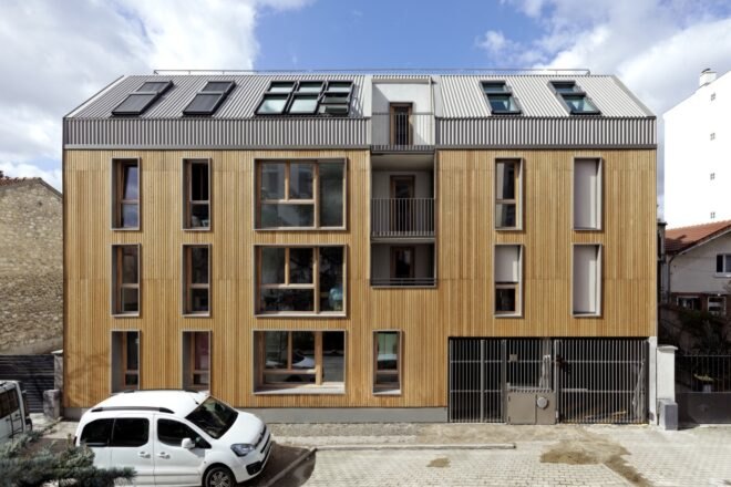 front view of large wood apartment building